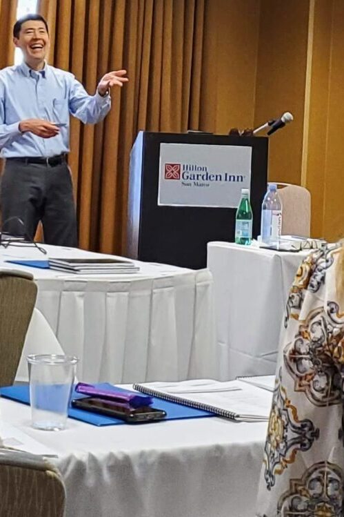 A photo of Michael Neuendorff teaching at the CEC in-person seminar