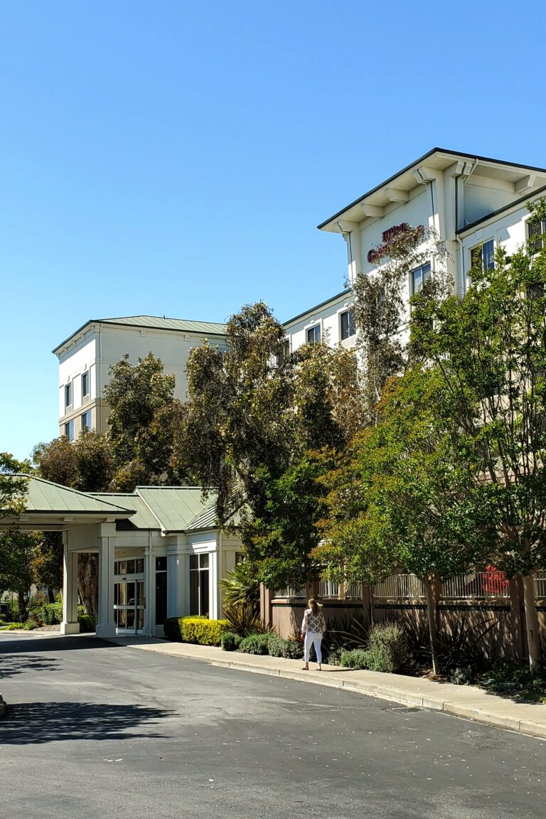 The outside view of the Hilton hotel building where the CEC in-person seminar is held.