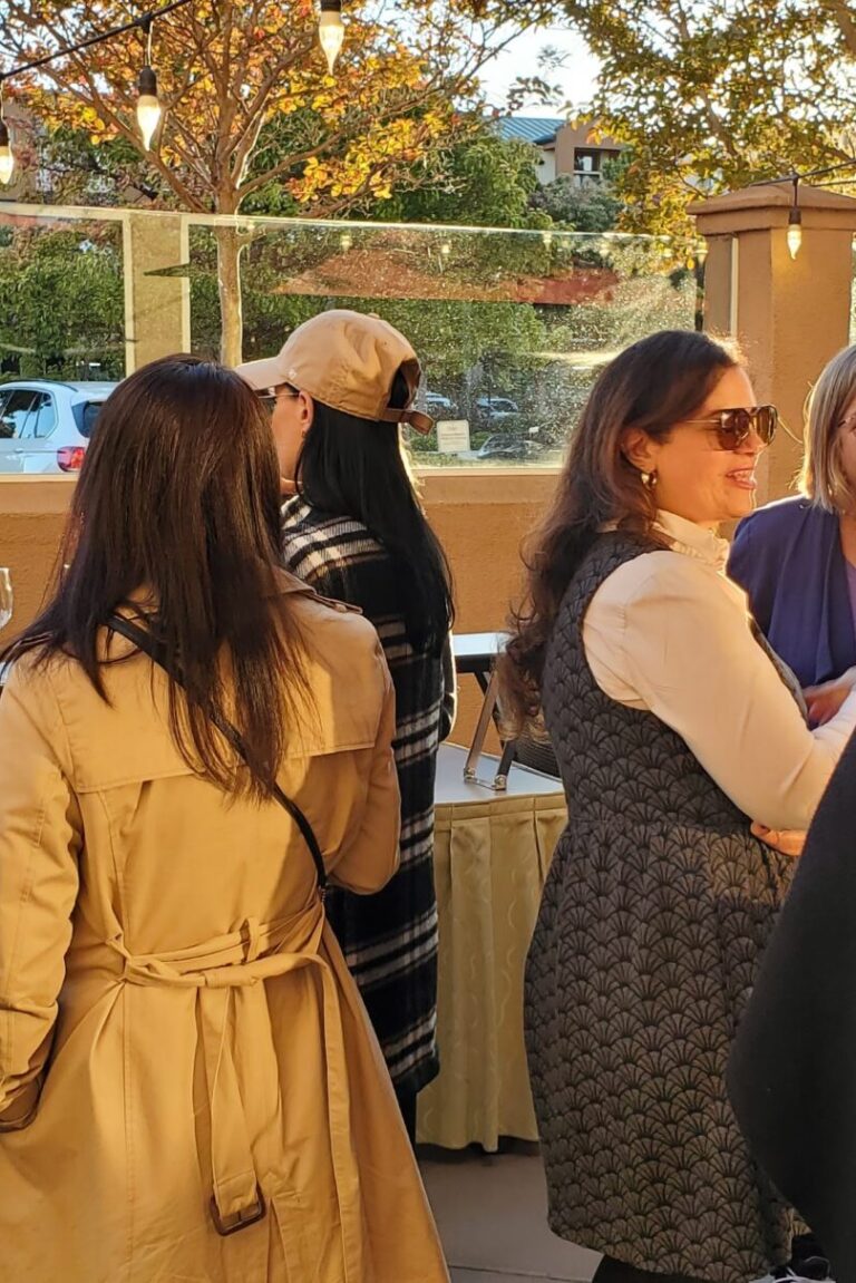 Seminar attendees and instructors enjoying the reception.