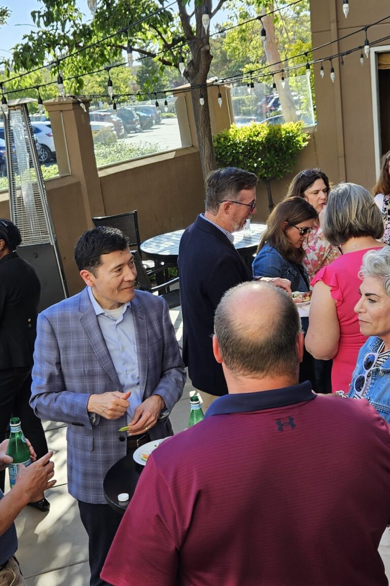 Seminar attendees and instructors enjoying the reception.