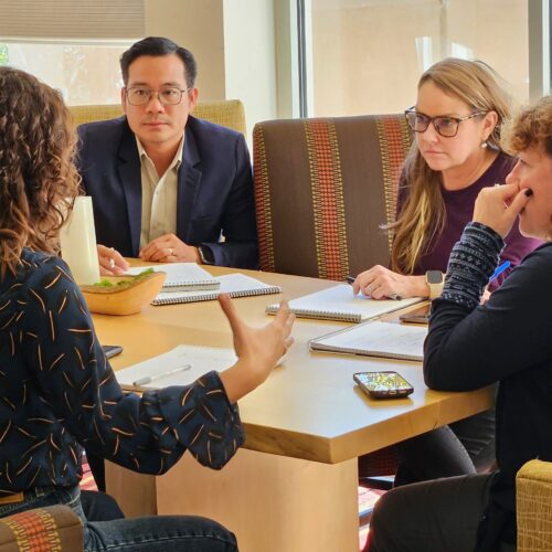 Seminar attendees having a group discussion.