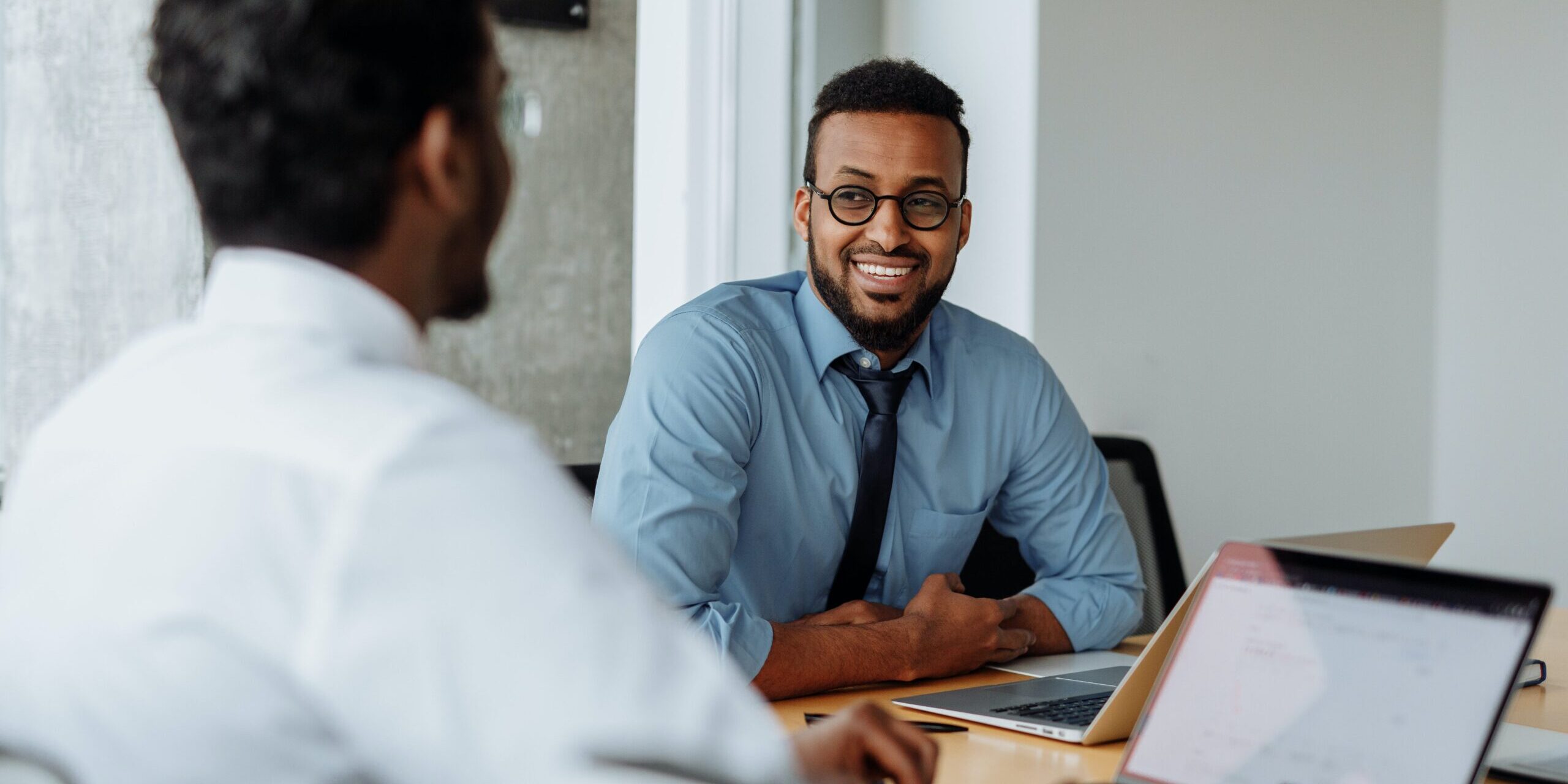 Two people on a coaching meeting.