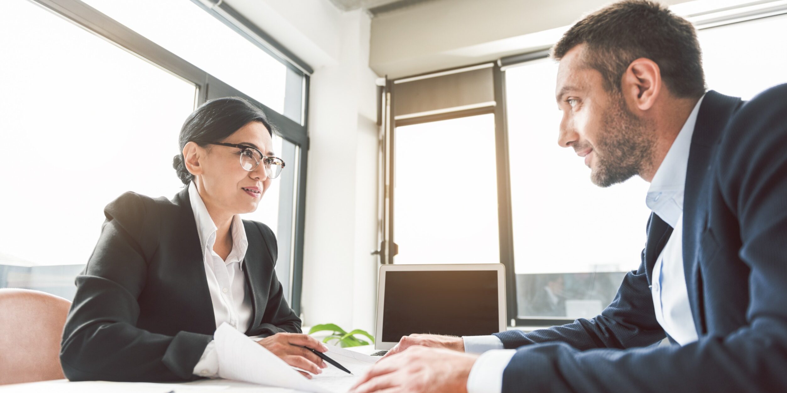 An executive coaching session with two professionals.