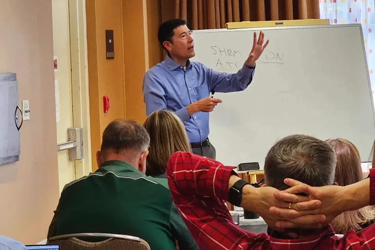 Michael Neuendorff speaking during the CEC in-person seminar