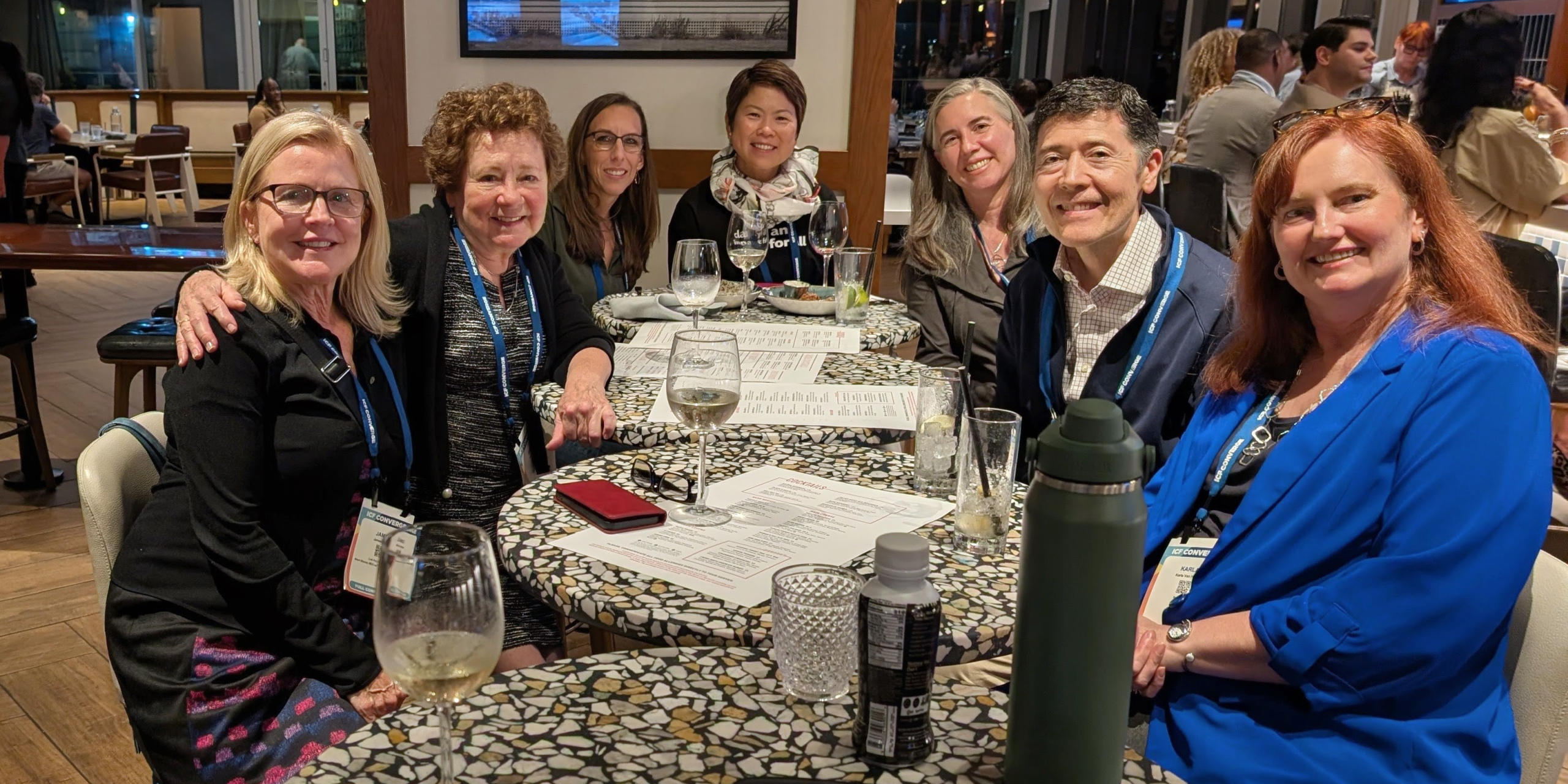 A group of ICF Converge 2025 attendees, including Michael Neuendorff.