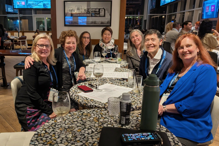 A group of ICF Converge 2025 attendees, including Michael Neuendorff.