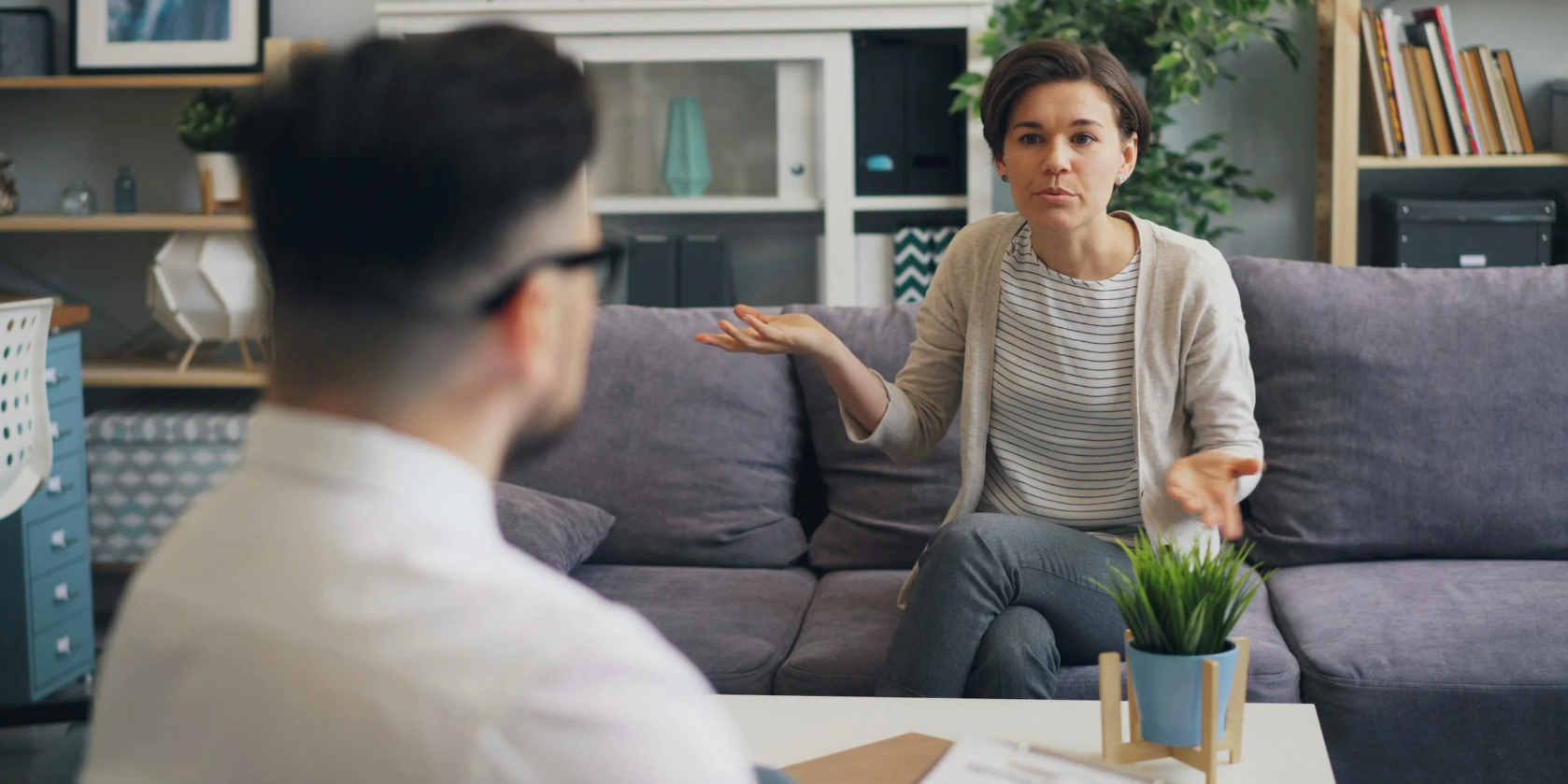 A therapist listening intently to a client.