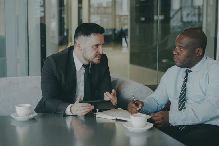 A businessman engaged in a coaching session.