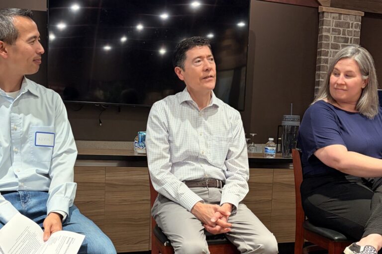 The three executive coaches, Michael Neuendorff in the middle, at the Silicon Valley Exchange panel.